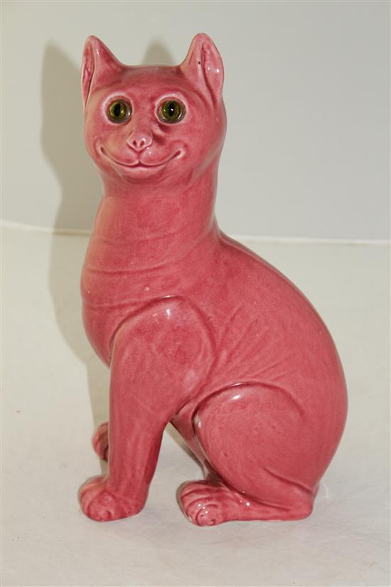 After Louis Wain. A Weymss pink glazed model of a seated cat, 32.5cm